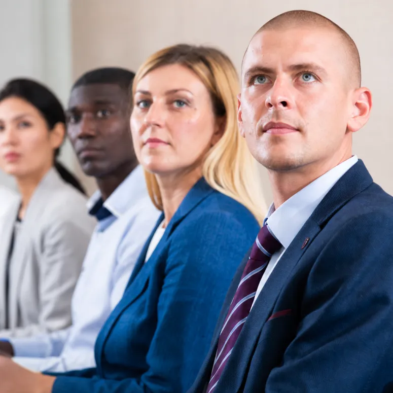 male and female executives side view in training