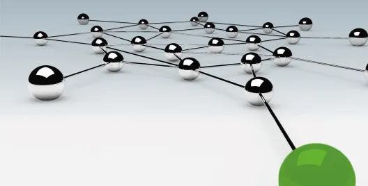 Interconnected silver balls with prominent green ball