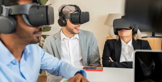 professional team wearing virtual reality headsets